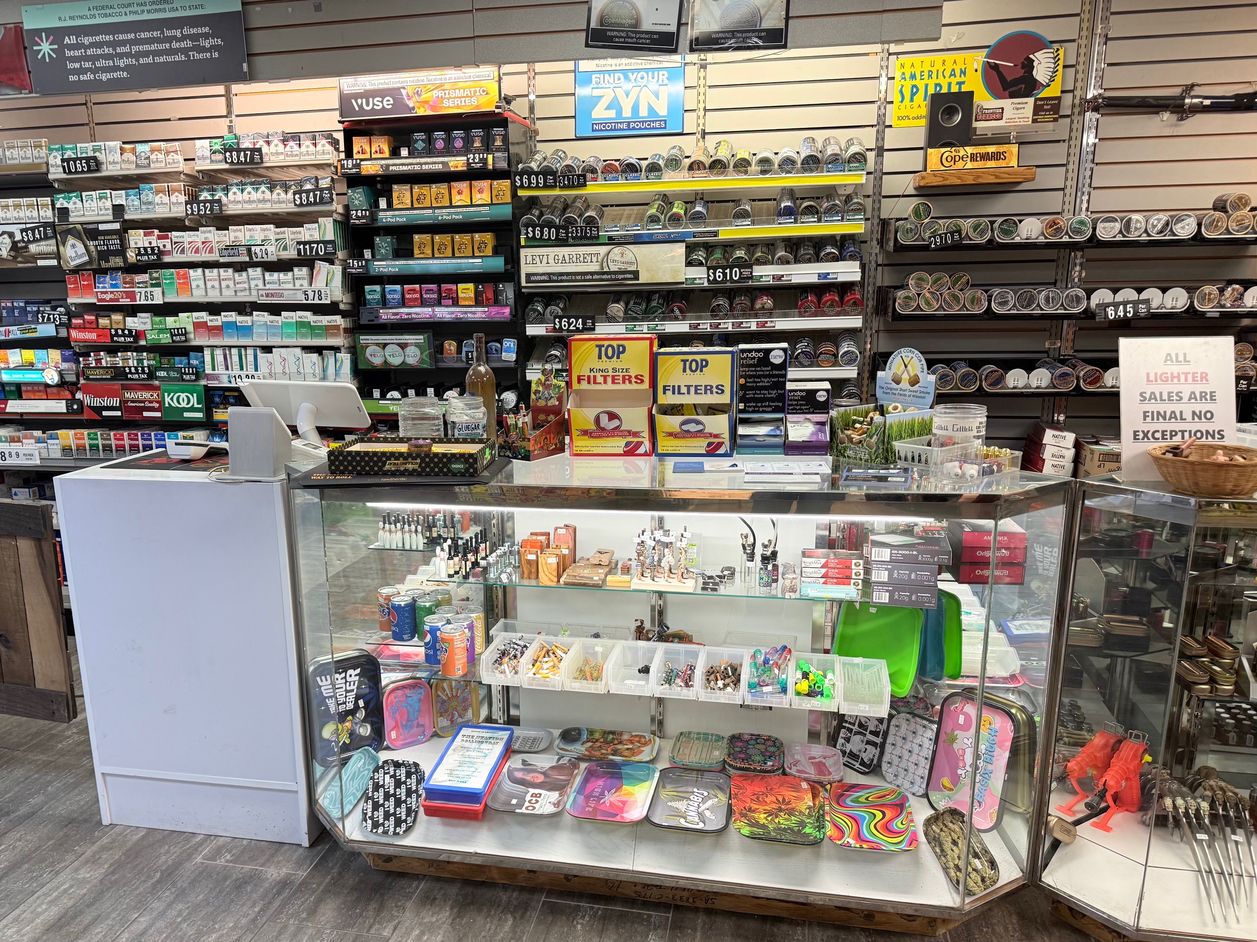 Front counter at Frontier Tobacco with candy, snacks and accessories