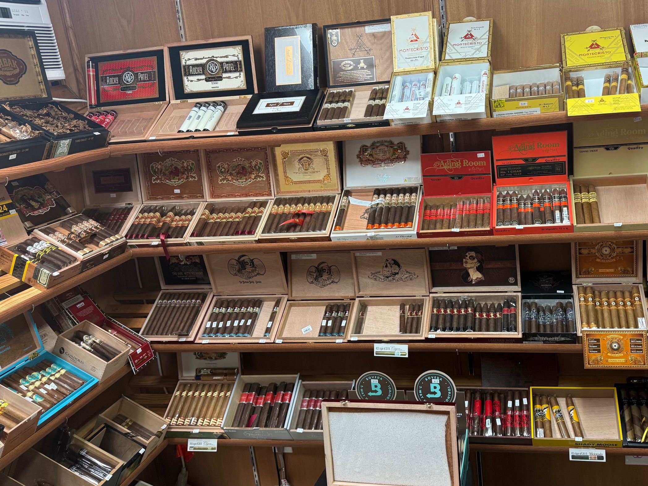 Premium cigar display with open boxes