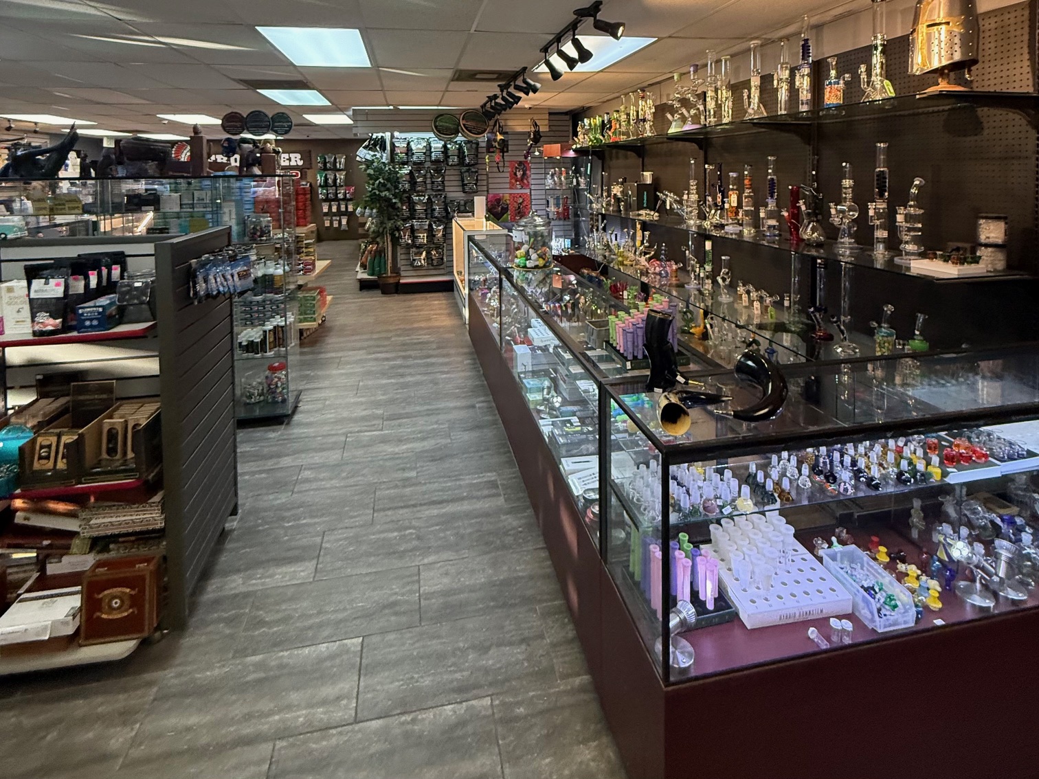 Long glass case filled with American-made glass pipes