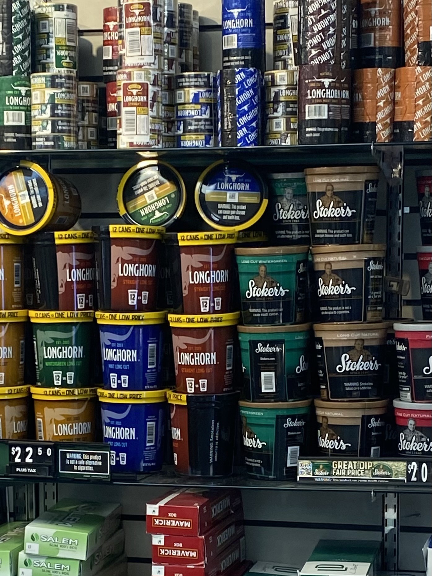 Longhorn and Stoker's smokeless tubs and cans stacked deep